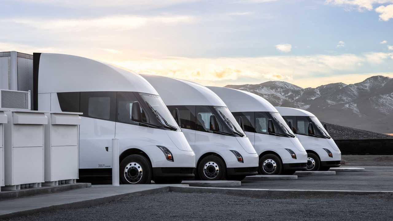 Tesla Semi trucks charging at Nevada Gigafactory.